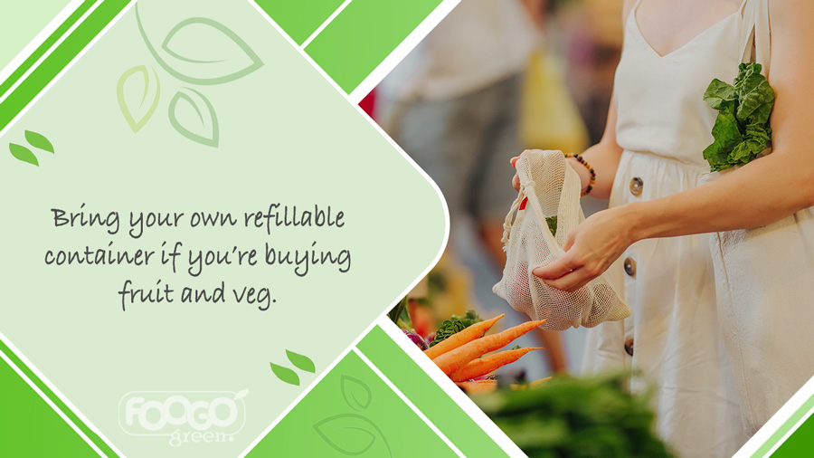 Shopper in supermarket with a reusable carrier bag